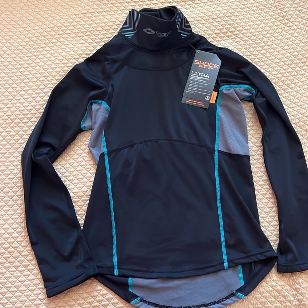 Women’s ultra compression hockey shirt. Size S.